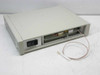 Hybricon 078-360 Reference Board Test Module – rear panel view showing IEC AC power inlet, label area, and attached SMA RF coaxial pigtail cable