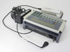 UBI MaxiLAN 1P barcode terminal right-side view showing rear port panel with serial, parallel, and Ethernet connections, and ScanPlus SP scanner