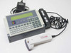 UBI MaxiLAN 1P barcode terminal front view with QWERTY keyboard, LCD display, ScanPlus SP laser scanner, magnetic stripe card reader, and power adapter