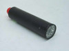 Lewis Engineering 502BL72 thermocouple indicator – side profile view showing cylindrical black housing with red-capped rear and circular dial face at front