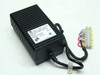 Elpac WRI 2721 power supply front-right view showing finned black chassis, AC power cord, and multi-pin output lead connector