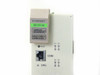 Cabletron 6E123-50 front panel close-up showing ETHERNET label, model number sticker, RJ-45 COM port, RESET button, CPU and E1–E4 LEDs