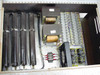 Interior of Kaiser Marquart TFX 5513/5514-2 burn-in fixture — four large wire-wound load resistors, two transformers, and terminal strip wiring visible