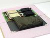 Silicon Graphics 303X2 Power Module Board angled view showing dual heat sinks and shielded transformer cans on green PCB