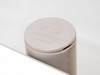 Anthro brand logo embossed on gray plastic post cap reading Anthro Portland OR