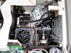 Perkin-Elmer 1430 interior – optical bench detail showing grating/mirror drive assembly, stepper motors, mechanical linkages, and scan mechanism