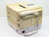 Mita LDC-650 rear view showing AC power inlet, ventilation grille, rating label, and included handset with coiled cord resting in cradle