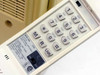 Mita LDC-650 handset close-up showing alphanumeric keypad with memory, redial, and line/hold keys, and UL listing mark on handset label