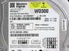 Western Digital WD300AB-00BVA0 30GB WD Caviar hard drive – close-up of label showing model, date (29 APR 2001), LBA, power specs, and J8 jumper settings