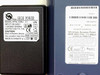 Belkin F5D6130 bottom label showing model number, IEEE 802.11b spec, FCC ID, serial number, MAC address, and power supply label