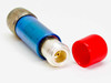 Mini-Circuits NAT-10 attenuator lying on side with red cap removed, exposing gold-pin N-female connector