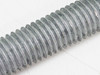 Macro close-up of galvanized 5/8"-11 threaded rod showing coarse 11 TPI thread detail and zinc coating