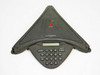 Polycom SoundStation Premier 2201-01900-001 conference phone – front view showing triangular body, LCD display, and keypad