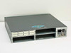 Cisco 3640 rear three-quarter view showing four empty module bays, rear power supply with IEC AC inlet and power switch