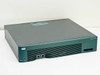 Cisco 3640 CISCO3640 3600 Series router chassis — front-right three-quarter view showing top, front panel with CON and AUX ports, and ventilation grilles
