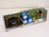 Power-One F24-12-A – interior top-down view showing toroidal transformer, large filter capacitors, and control PCB