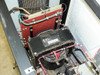 Internal close-up – red transformer core and Energy Research Associates sub-assembly module (model 4788) with toroid and wiring