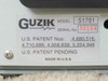 Guzik S1701 model label — shows Model S1701, Serial No. 30164, U.S. Patent numbers, and Made in U.S.A.