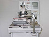 F&K Delvotec 6320 front view showing bonding station, 6320 label, Hitachi monitor, and Philips monitor mounted on cabinet