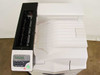 Kyocera Mita FS-9500DN – top-down view with cover open showing fuser and roller assembly, output tray, and control panel