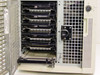 Arc PC 732765-001 interior view – side panel open showing six empty hot-swap hard drive sleds and backplane with ribbon cables