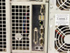 Arc PC 732765-001 rear I/O panel close-up – dual USB ports, RJ-45 Ethernet, dual DB-25 parallel ports, dual FireWire/serial ports, and PS/2 connectors with power warning label