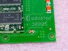 Adaptec 3000S silkscreen logo and model number close-up on PCB corner with AMM-232 memory module visible