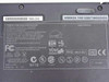 Compaq Armada 7400 bottom label showing model number 6300/T/6400/D/O/3, series 2910B, MPN 304081-005, FCC/TUV markings, and Product of Singapore designation