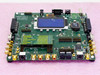 Philips Semiconductors MACH-III Minimodule Advanced Carrier Hardware — top view showing LCD display, SMA connectors, FPGA array, and pin headers