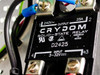 Close-up of Crydom D2425 solid-state relay — 240V AC output, 25A, 3-32V DC input