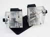 Micro Switch limit switch assembly front view — two clear acrylic enclosures with internal microswitches mounted on shared black base plate