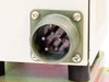 Close-up of MS3102A18-1P military-style circular multi-pin connector on rear/bottom of fiber optic light source unit