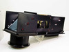 Oriel 68709 — interior of black housing section with top removed, showing one remaining front mirror and internal optical cavity