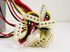 Astec AA14500 AT power supply — close-up of multiple Molex 4-pin peripheral output connectors on the wire harness
