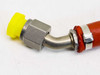 Close-up of 45-degree swaged elbow fitting on one end of the Mil-H-25579 hydraulic hose assembly with yellow protective cap fitted