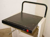 Digital MNCCT-AA cart – top shelf close-up showing black MNC11-HA power supply unit with ventilation grille and red power switch