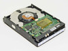 IBM DTTA-351010 25L2567 10GB IDE hard drive – internal PCB view showing controller board, platters, and read/write head assembly
