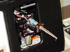 Close-up of HyBond 616-12 ultrasonic bonding head assembly showing transducer, bonding wedge tool, wiring harness, and adjustment mechanism