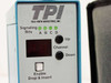 TPI 108-DS1 front panel detail showing Signaling Bits A B C D LED indicators, red LED channel display, Up/Down Channel buttons, and Enable Drop and Insert button