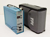 Tele-Path Industries TPI 108-DS1 DS1 Test Access Module in blue enclosure shown alongside gray TPI branded carry case — front and side view