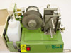 Cooke Tokki TP-125 MK III top-down view showing internal polishing mechanism, abrasive wheel, fluid reservoir, and fiber chuck assembly