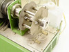 TP-125mk2 pump head detail showing stainless steel spindle assembly, spring-loaded guides, and tubing path