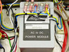 Acopian PB15-50 AC to DC Power Module close-up inside Hughes Range Tone Processor chassis, Easton PA, with wiring harness
