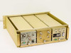 3dbm 70MDF-DAT-BRZ satcom modulator chassis – rear three-quarter view showing all plugin module rear panels and chassis structure