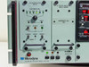 Microdyne 1400-MR front panel close-up showing PM Demodulator 1451-D and IF Filter Amplifier 1420-I Series with Bandwidth 100 KHz label and status LEDs