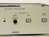 Hughes FM Data Detector front panel detail showing FM DATA DETECTOR label, Nutation Offset and Gain controls, Analog Data switch, and Hughes nameplate