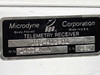 Microdyne 1400-MR data plate showing model number 1400-MRA, part number 106-912-01, serial number 031, and Microdyne Corporation Ocala Florida Made in USA label
