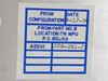 Microdyne 1400-MR PROM configuration label showing PROM part number 106-261-77, location on MPU PC board, configuration A23U1, dated 4-17-90