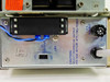 Rockwell 8548-00 Power Supply rear panel closeup showing 24V/48V DC output selector switch, DC output and GND terminals, and 1.5A Slo-Blo fuse holder