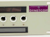Dynetcom Dyna-Patch Mark-1 front panel close-up showing Dynetcom logo badge and single-hole monitoring jacks